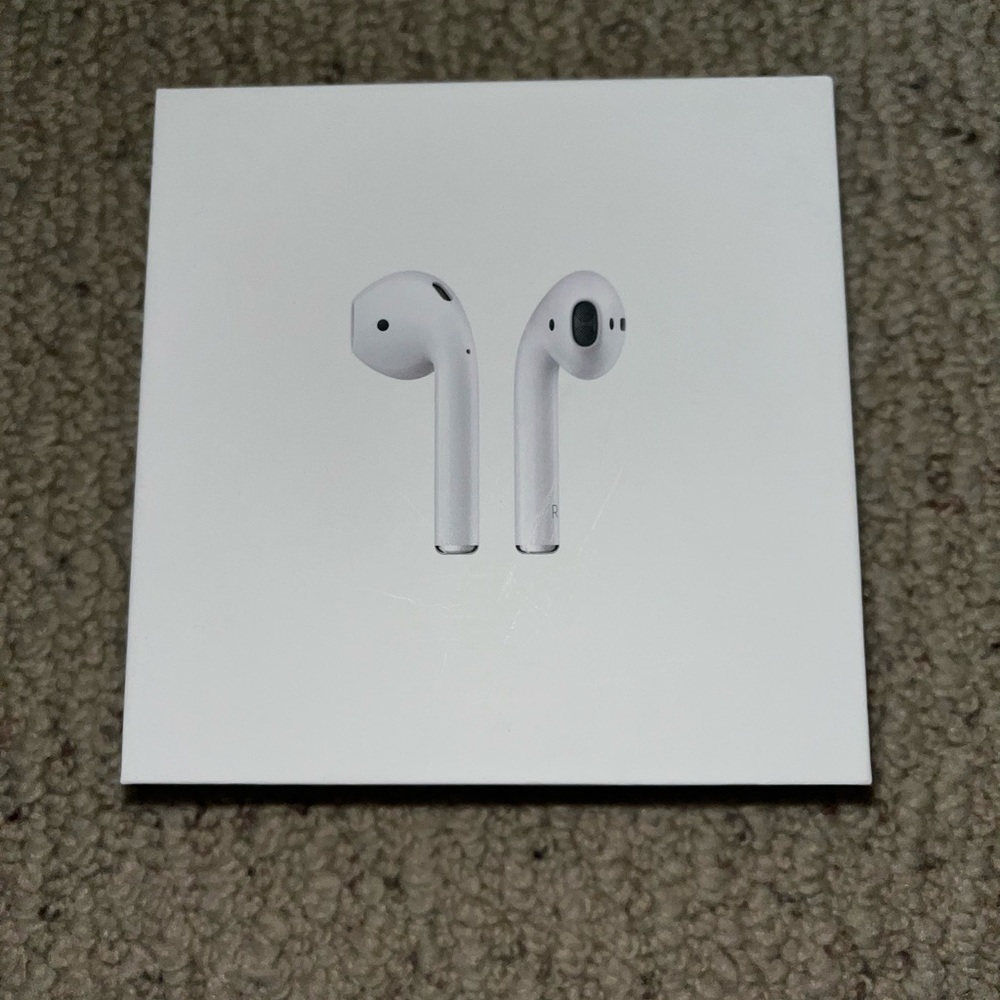 Used Apple AirPods (condition is a little worn but they work perfectly)